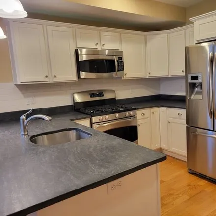 Rent this 2 bed townhouse on 855 Lagrange Street in Boston, MA 02467