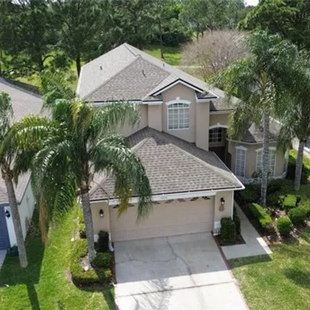 Buy this 4 bed house on Hunter's Creek Golf Club in 14401 Sports Club Way, Orlando