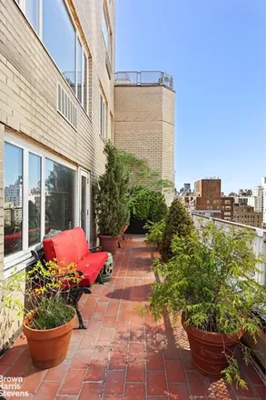 Image 2 - 166 EAST 63RD STREET 16C in New York - Townhouse for sale