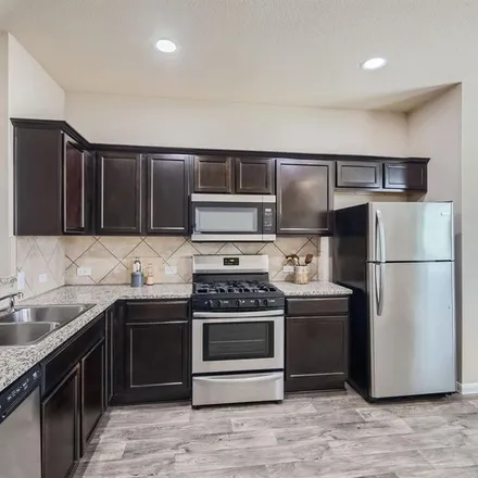 Rent this 3 bed apartment on 3111 Tilmon Lane in Travis County, TX 78725