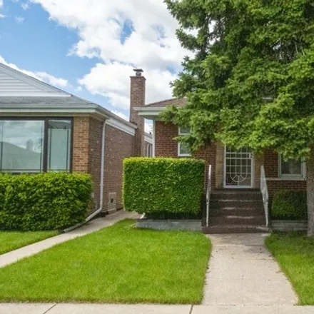 Buy this 3 bed house on 4510 South Springfield Avenue in Chicago, IL 60632
