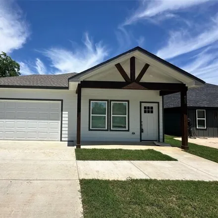 Rent this 4 bed house on 619 West Morton Street in Denison, TX 75020
