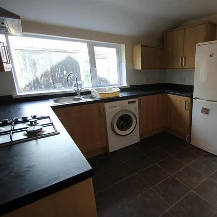 Rent this 4 bed townhouse on Llanishen Street in Cardiff, CF14 3QD