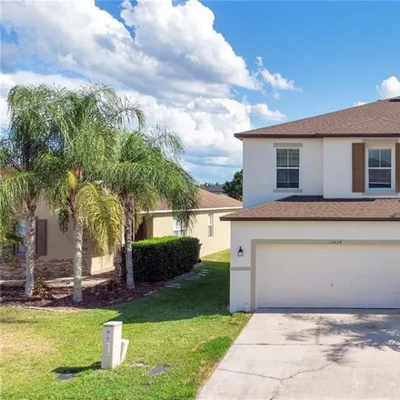 Rent this 4 bed house on 10814 Tilston Point in Orange County, FL 32832