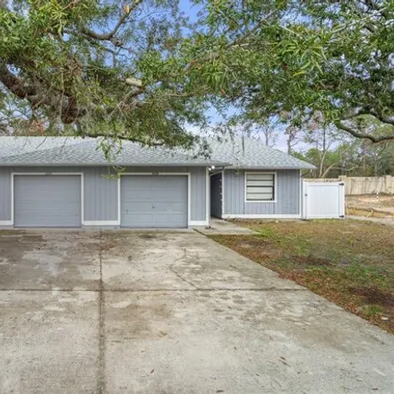 Buy this 4 bed house on 8054 Canterbury Street in Spring Hill, FL 34606