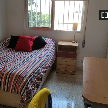 Rent this 2 bed room on Calle Periodista Filiberto Mira in 41008 Seville, Spain