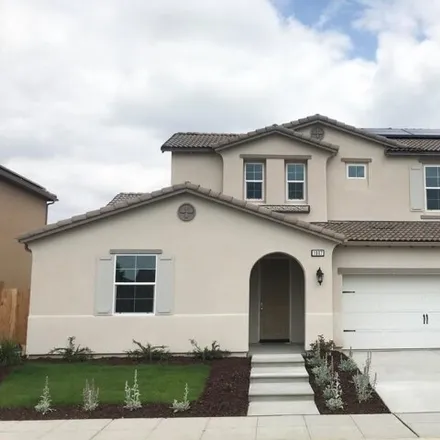 Rent this 4 bed house on 1023 Carmelita Avenue in Fresno County, CA 93619