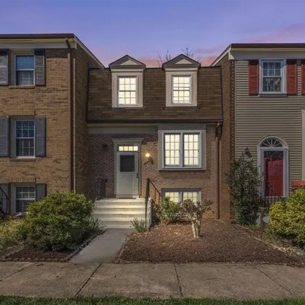 Rent this 4 bed townhouse on 8640 Dellway Lane in Merrifield, VA 22180