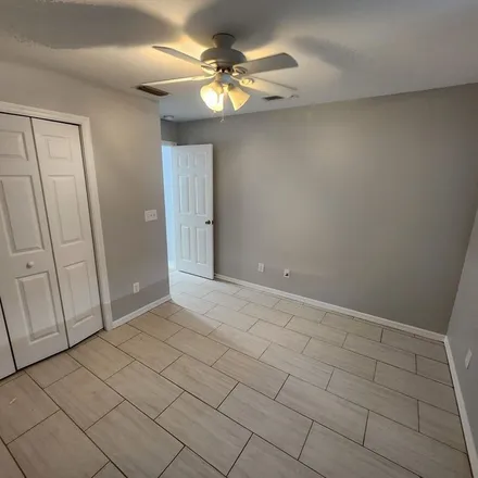 Rent this 3 bed apartment on 4132 Southwest 8th Place in Cape Coral, FL 33914