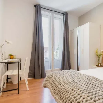 Rent this 11 bed room on Calle de Alejandro González in 5, 28028 Madrid