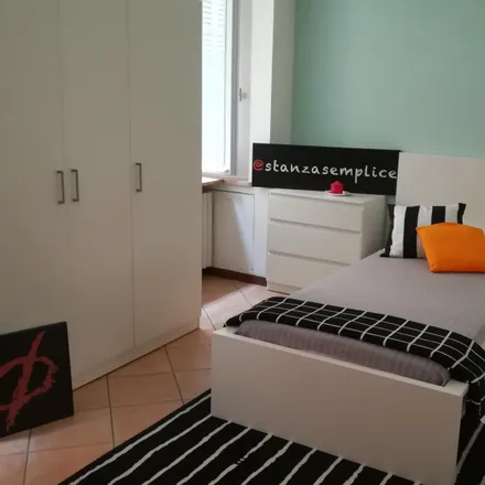 Rent this 4 bed room on Strada Cavour 22a in 43121 Parma PR, Italy
