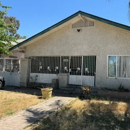 Buy this 4 bed house on 3044 Ventura St in Fresno, California
