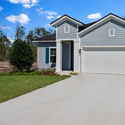 Rent this 4 bed house on Lake Avenue in Palm Coast, FL 32164