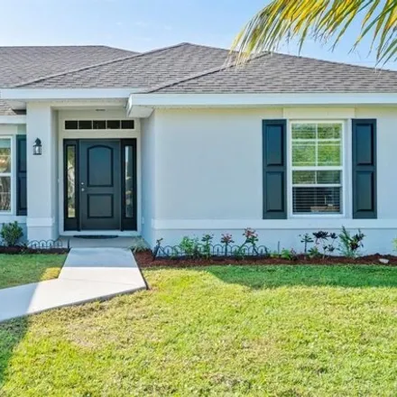 Buy this 4 bed house on 4975 Nw Fitzgerald Ave in Port Saint Lucie, Florida