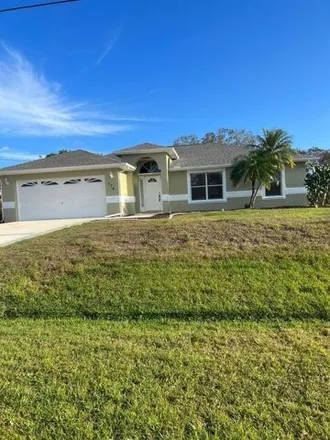 Rent this 3 bed house on 764 Southeast Atlantus Avenue in Port Saint Lucie, FL 34983