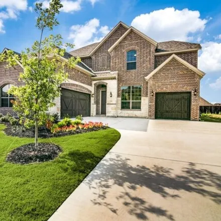 Buy this 4 bed house on 1042 Amber Knoll Drive in Rockwall, TX 75087