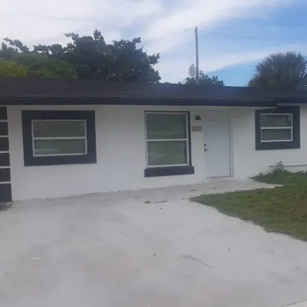 Buy this 4 bed house on 1600 West 12th Court in Riviera Beach, FL 33404