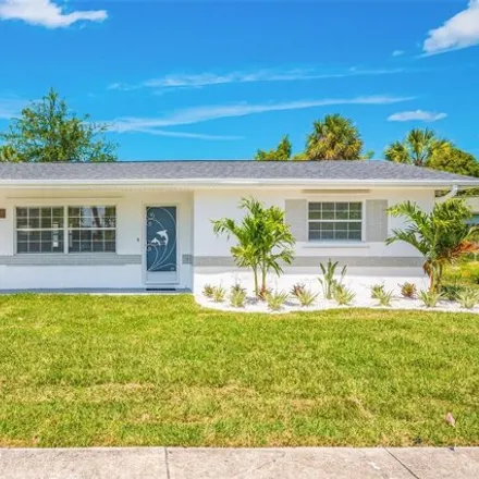 Buy this 2 bed house on 7010 Boca Ciega Drive in Saint Pete Beach, Pinellas County