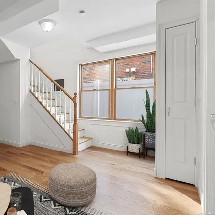 Image 2 - 66-23 73rd Place, New York, NY 11379, USA - Townhouse for sale