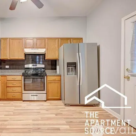 Rent this 2 bed apartment on 3528 W Palmer St
