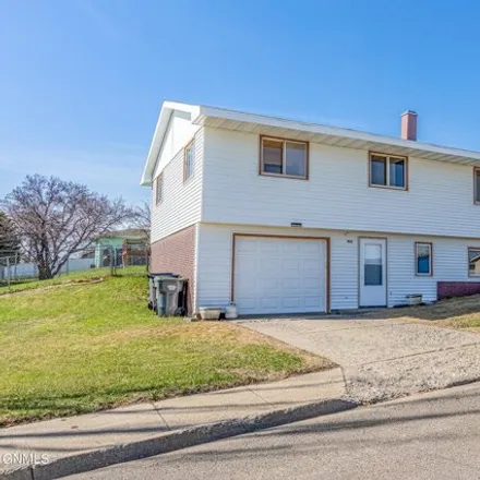 Buy this 4 bed house on 419 Division Street Northeast in Mandan, ND 58554