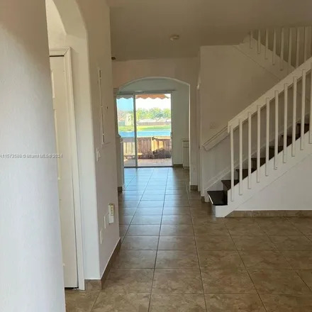 Rent this 3 bed apartment on 1480 Southeast 24th Court in Homestead, FL 33035