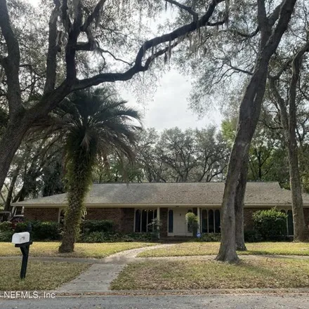 Rent this 4 bed house on 5430 Woodwind Terrace in Chaseville, Jacksonville