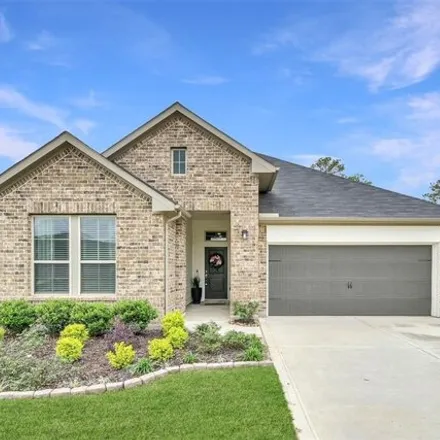 Rent this 4 bed house on Terrace Cove Drive in Montgomery County, TX 77387