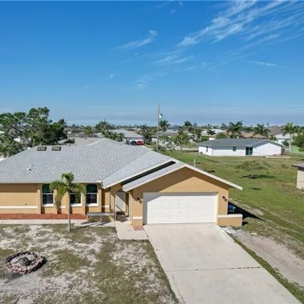 Buy this 4 bed house on 3026 Southwest 6th Avenue in Cape Coral, FL 33914