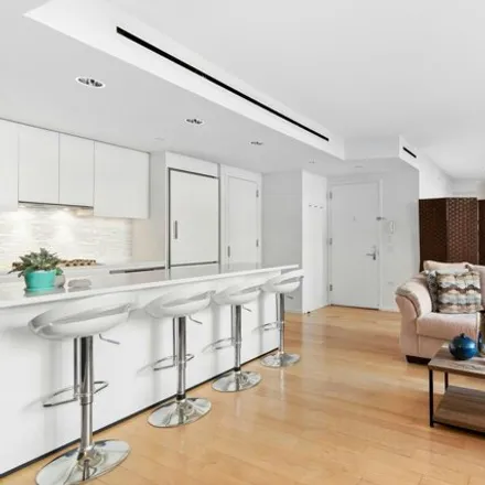 Rent this 2 bed townhouse on 410 West 53rd Street in New York, NY 10019