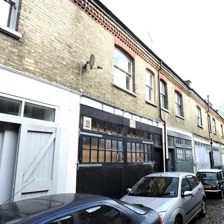 Rent this 5 bed townhouse on Robin's Garage in Unit D Cambridge Grove, Hove