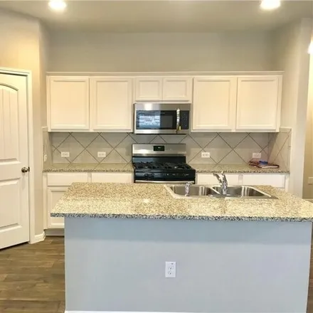 Rent this 4 bed house on 10904 Defender Trail in Austin, TX 78754