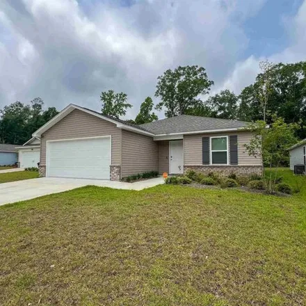 Rent this 4 bed house on Hilburn Road in Ensley, FL 32514