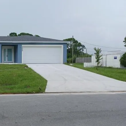 Buy this 3 bed house on 2028 Waverly Avenue Southeast in Palm Bay, FL 32909