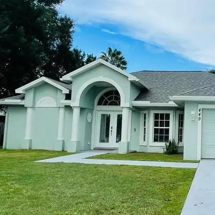 Buy this 3 bed house on 449 Northeast Airoso Boulevard in Port Saint Lucie, FL 34983