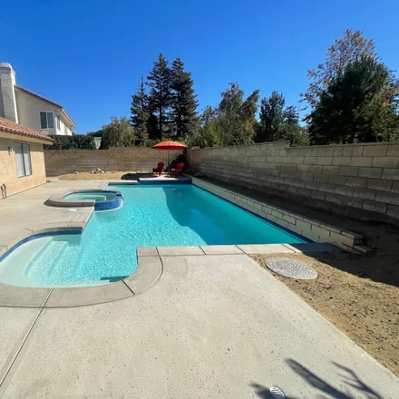 Rent this 4 bed house on 12406 Spring Creek Road in Moorpark, CA 93021