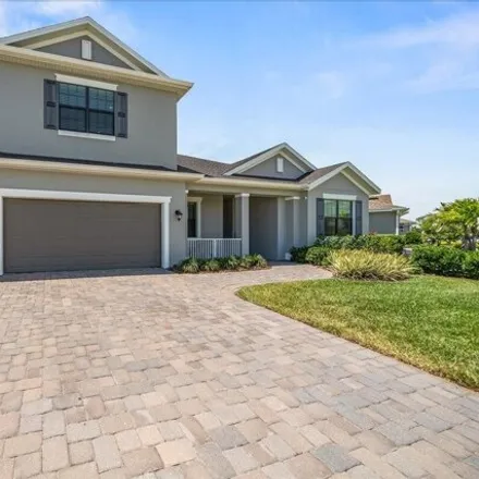 Buy this 4 bed house on 3129 Trasona Drive in Viera, FL 32940