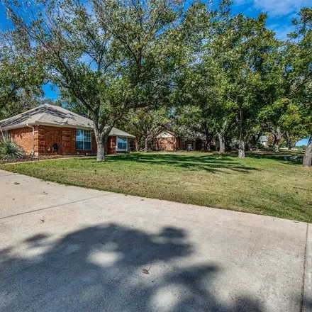 Rent this 3 bed house on 9577 Bellechase Road in Pecan Plantation, Hood County