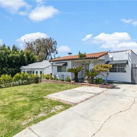 Buy this 3 bed house on 4306 West Olympic Boulevard in Los Angeles, CA 90019