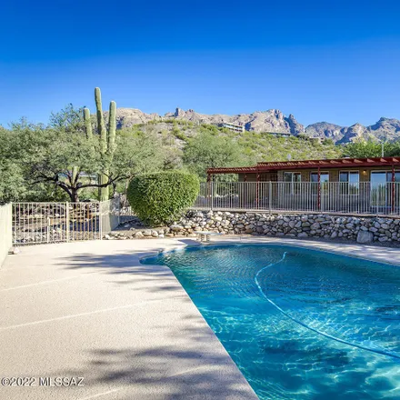 Buy this 4 bed house on 3628 East Kingler Spring Place in Catalina Foothills, AZ 85718