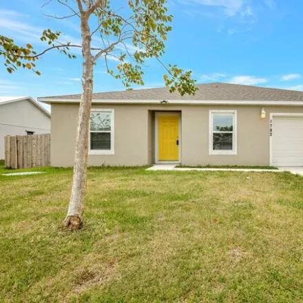 Buy this 4 bed house on 1782 Se Ridgewood St in Port Saint Lucie, Florida
