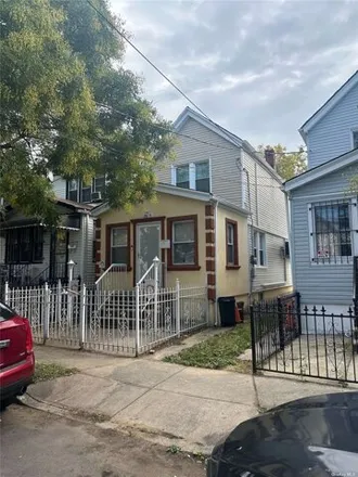 Buy this 3 bed house on 150-74 116th Road in New York, NY 11434