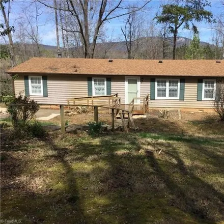 Buy this studio apartment on 1033 Old Wagon Road in Stokes County, NC 27021