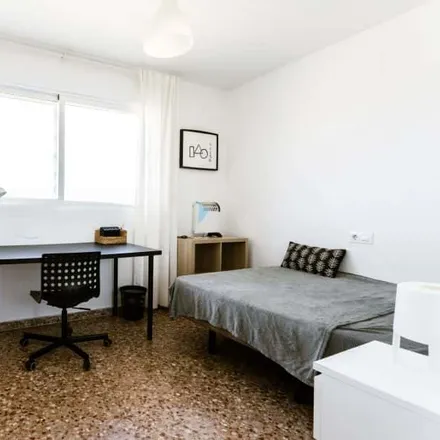 Rent this 5 bed room on Carrer del Serpis in 46022 Valencia, Spain