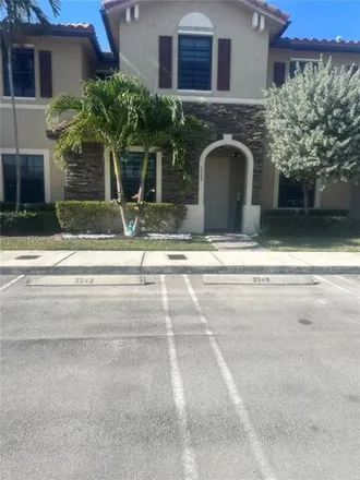 Rent this 3 bed townhouse on 3549 West 89th Place in Hialeah, FL 33018