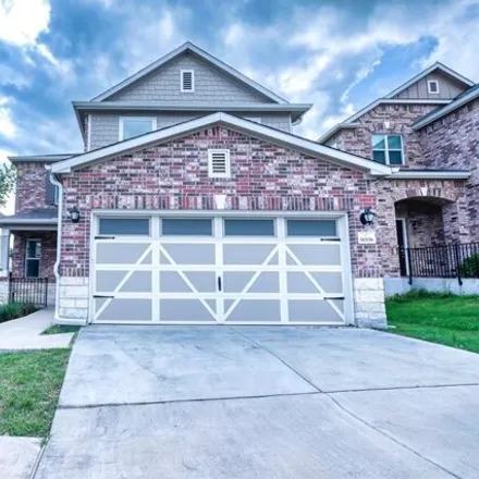 Rent this 4 bed house on 9006 Pin Brush Drive in Austin, TX 78715