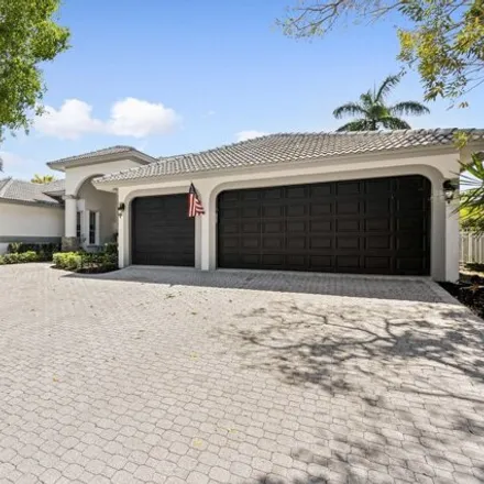 Buy this 5 bed house on Eagle Trace Boulevard West in Coral Springs, FL 33071