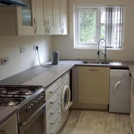 Rent this 4 bed townhouse on Cadleigh Gardens in Harborne, B17 0QB
