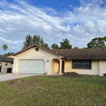 Buy this 3 bed house on 509 Southeast Fallon Drive in Port Saint Lucie, FL 34983