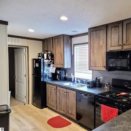Image 5 - 1099 Peachtree Court, Union Charter Township, MI 48858, USA - Apartment for sale